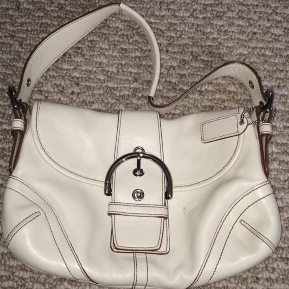 - White leather coach purse